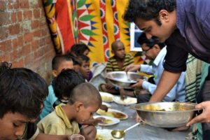 sharing the food to poor